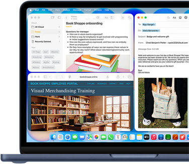 MacBook Neo, Farbe Indigo, das Display zeigt eine Begrüßungsmail für neue Mitarbeitende in einer Buchhandlung, andere Fenster enthalten Notizen mit Informationen zum Onboarding und zum Mitarbeiterportal der Buchhandlung in Safari